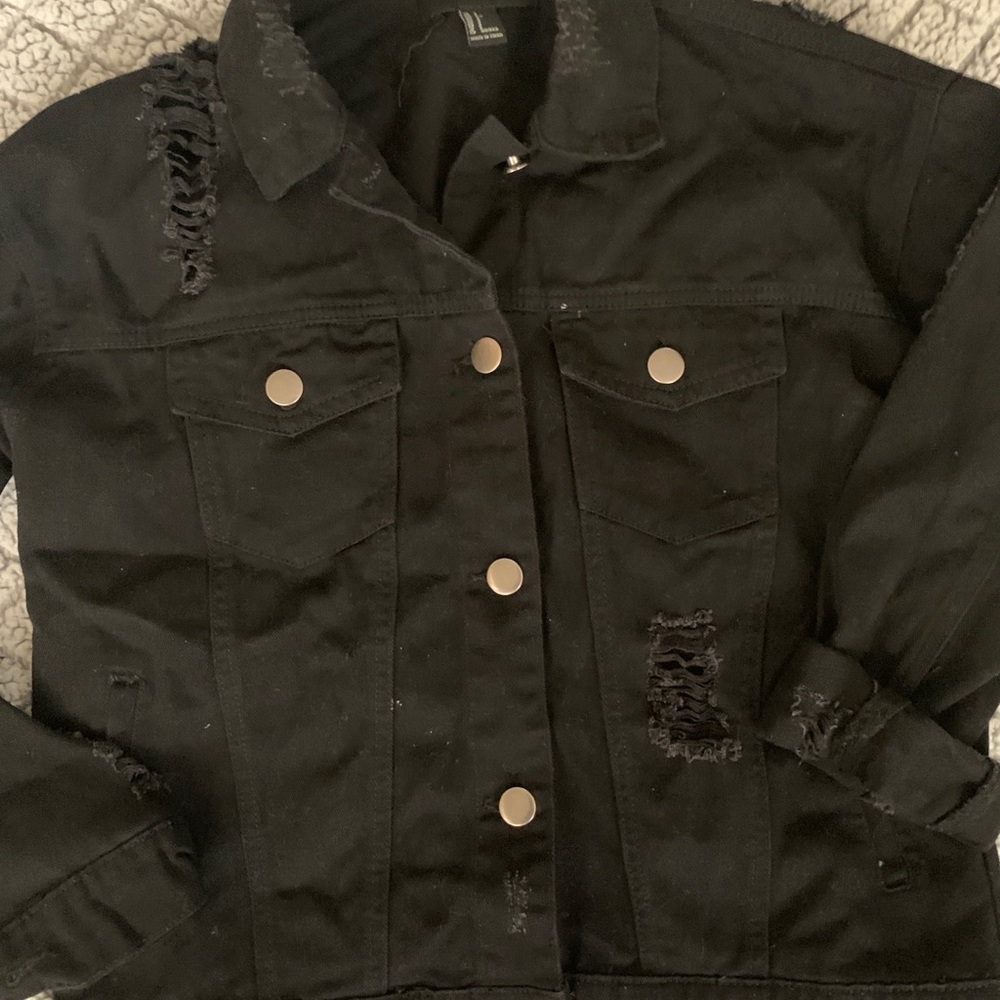 Black distressed denim jacket